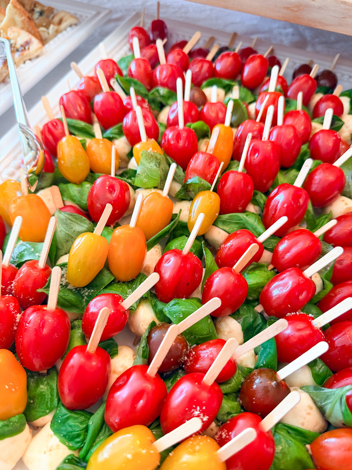 Caprese skewers with balsamic marinated mozzarella