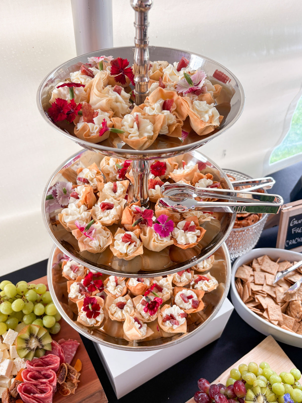 Whipped sweet onion goat cheese phyllo cups with cripsy prosciutto