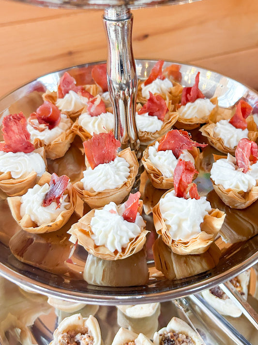 Whipped sweet onion goat cheese phyllo cups with cripsy prosciutto
