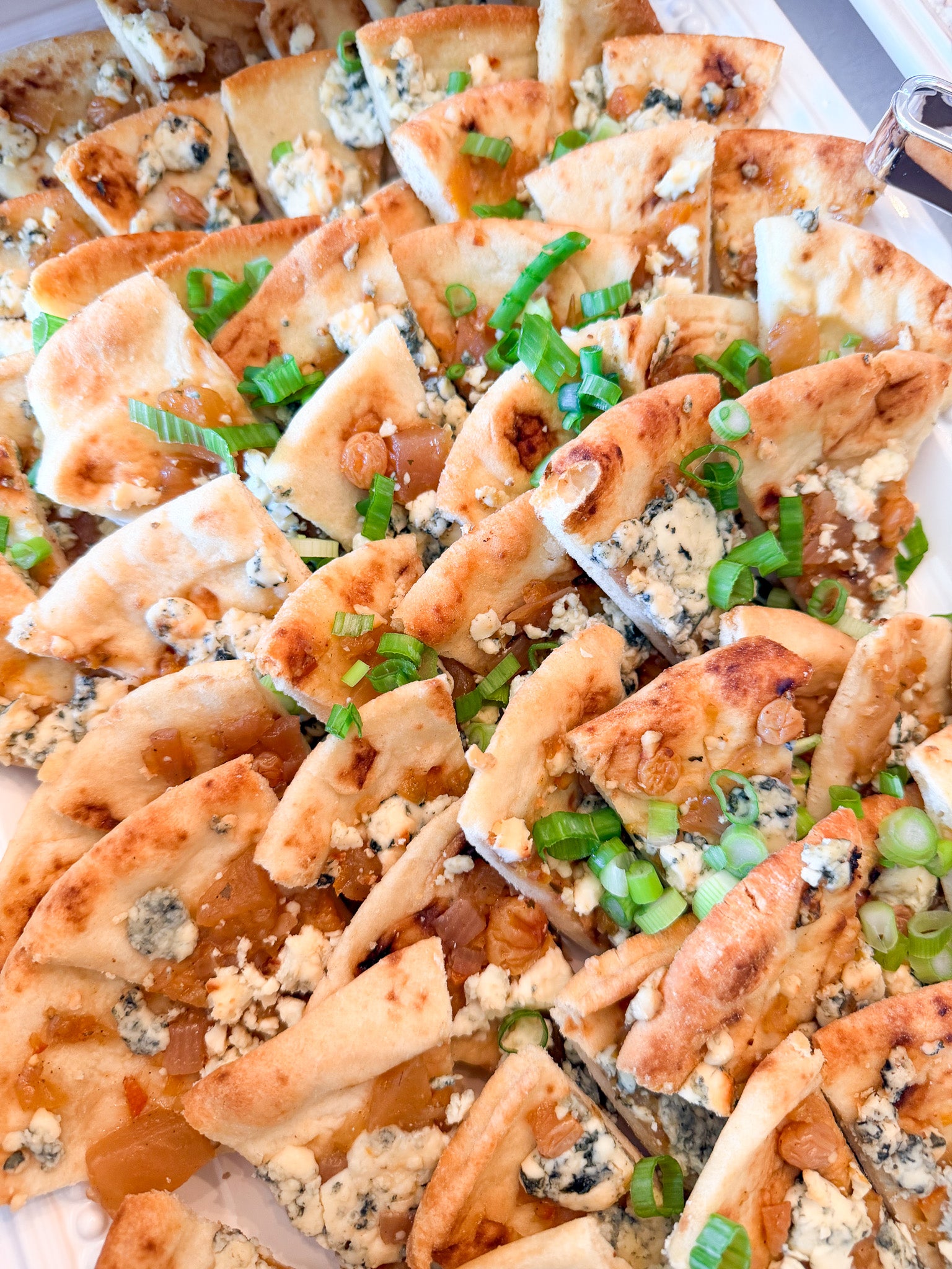 mini-flatbreads-with-apple-onion-chutney-blue-cheese-crumble